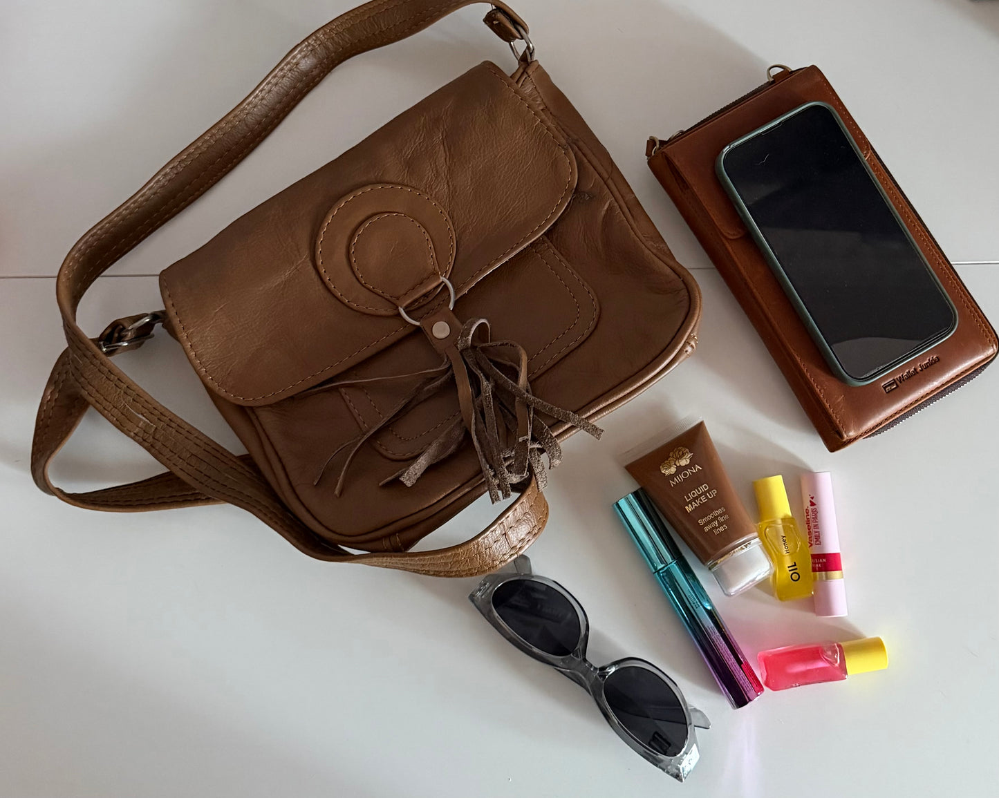 Genuine Leather Crossbody Bag with Tassel Detail